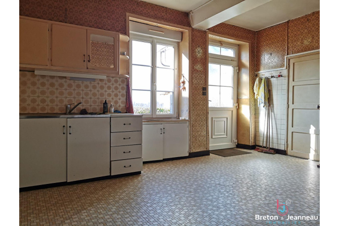 Maison à La Chapelle au Riboul