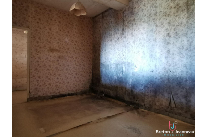 Maison à La Chapelle au Riboul