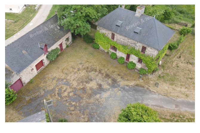 Propriété avec plan d'eau proche de Villaines la Juhel