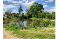 Propriété avec plan d'eau proche de Villaines la Juhel