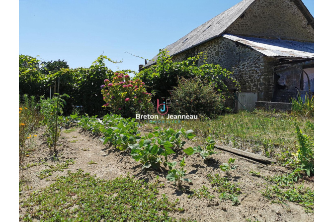 Maison de bourg à la Chapelle au Riboul
