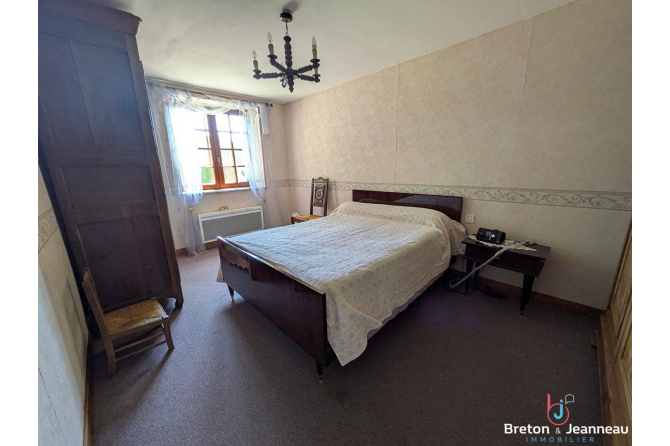 Maison en pierre avec étang sur 9 hectares à 5 min d'Évron