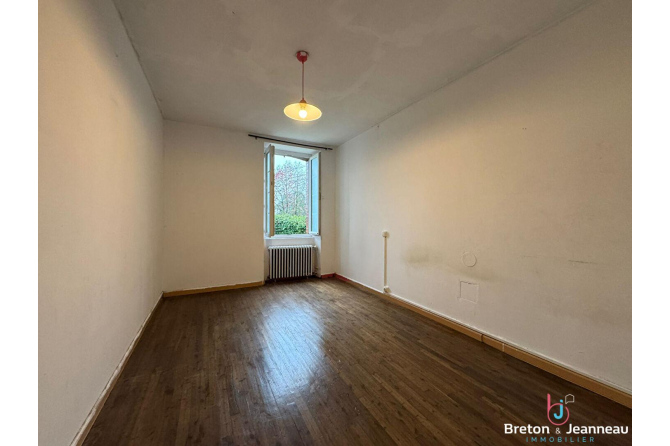 Maison en pierres à Loiron-Ruillé