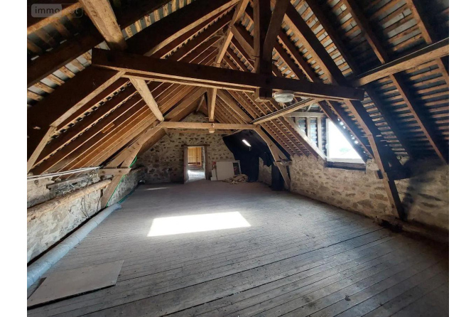 Maison en pierres à Loiron-Ruillé