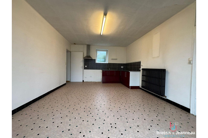 Maison en pierres à Loiron-Ruillé